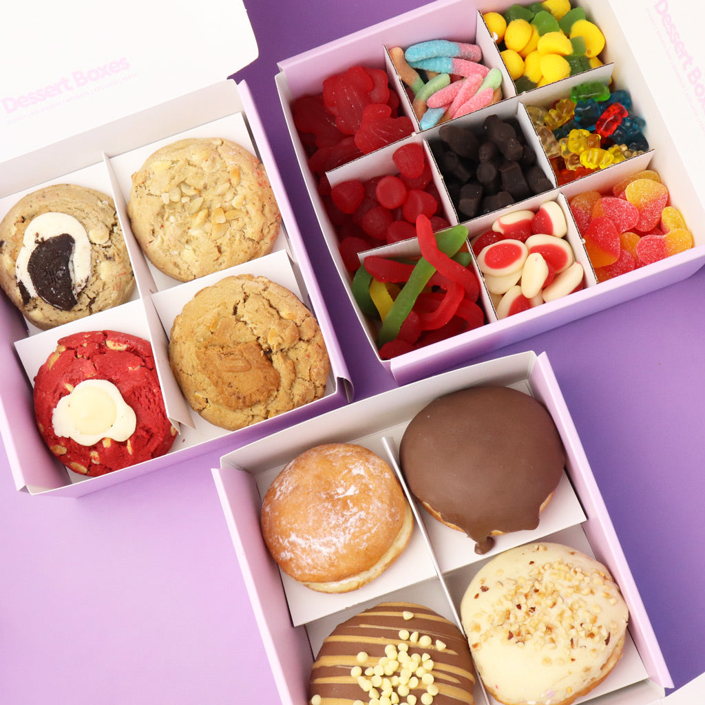 Assorted cookies, candies and chocolate donuts