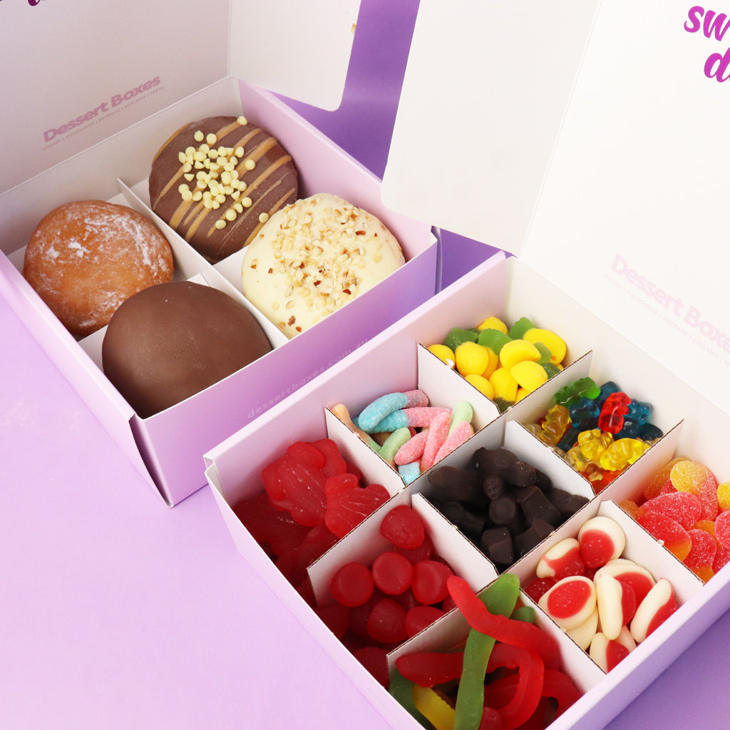 Assorted candies and filled chocolate donuts