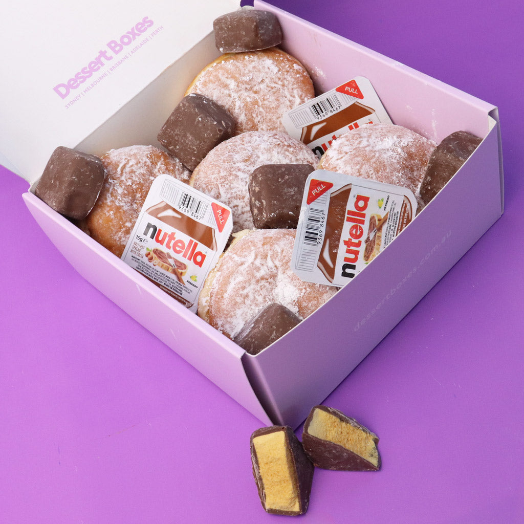 Box of Nutella donuts with visible Nutella branding on a purple background